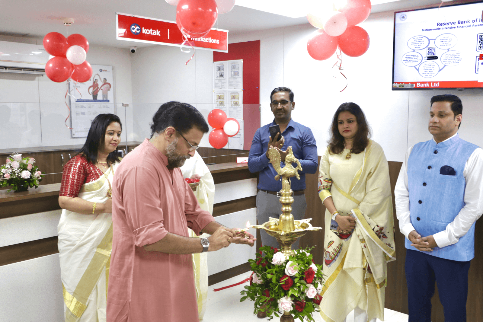 CEO Technopark, Col Sanjeev Nair (Retd.) lighting the auspicious lamp on the occasion of the inauguration of Kotak Mahindra Bank's first branch in Technopark.