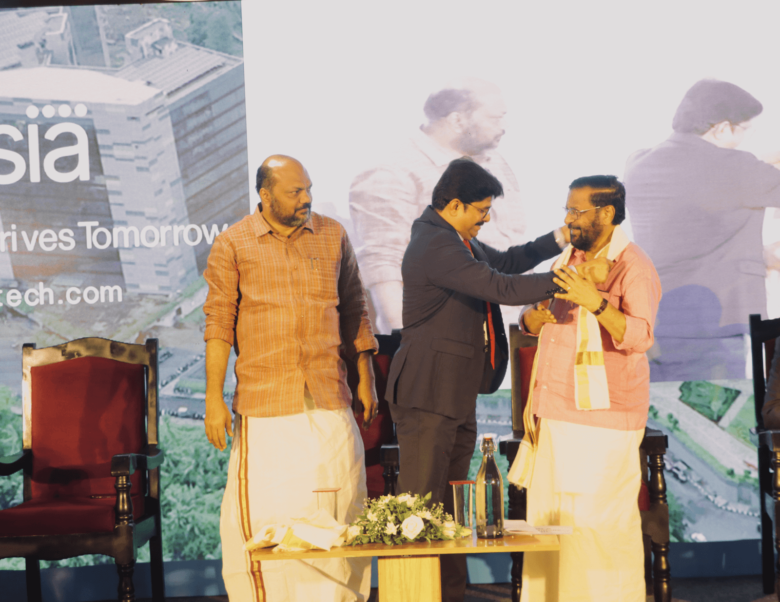 Mr. Jijimon Chandran, founder and CEO of Acsia, felicitating Shri. Kadakampally Surendran