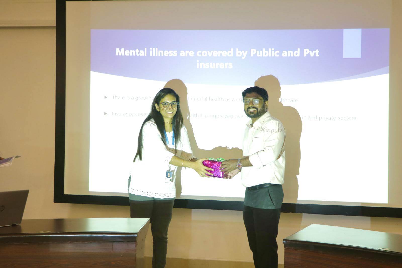 Dr. Anantha Krishnan, Consultant Psychiatrist, SRKM Hospital, Thiruvananthapuram being presented a token of appreciation.